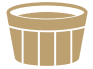 Brown paper cup filled with a steaming hot chocolate, likely a ramekin, on a white background